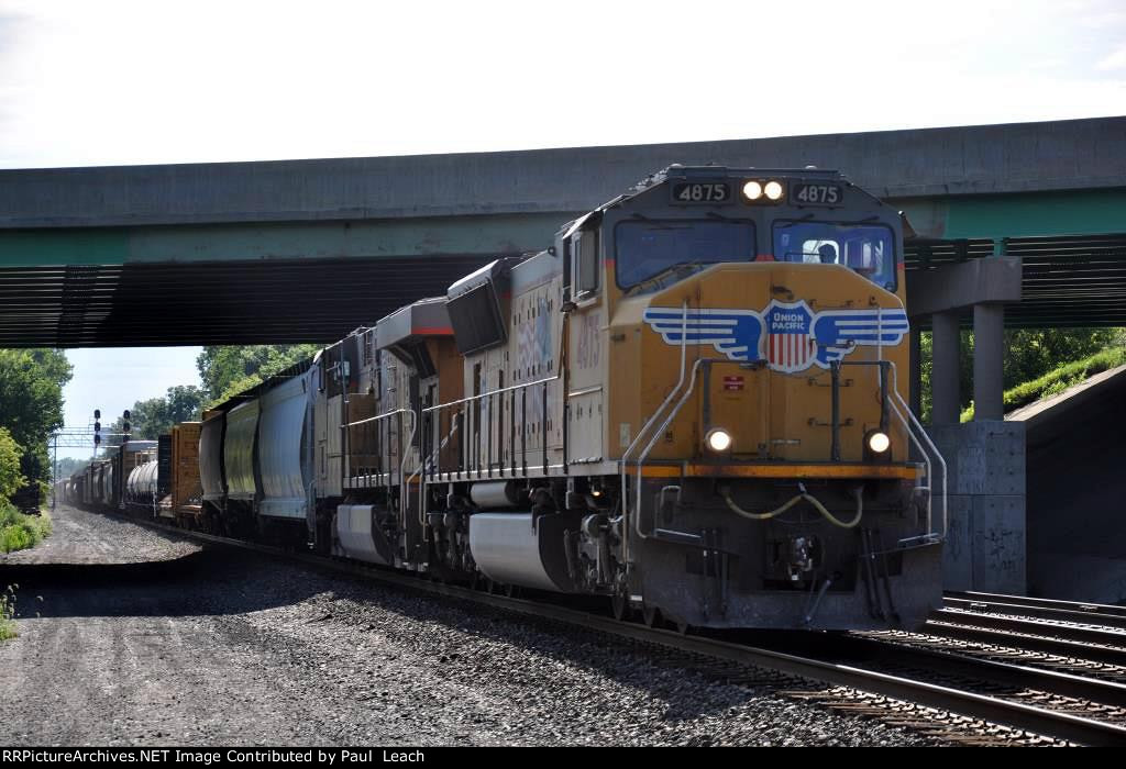 Manifest rolls west under the interstate